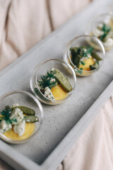 Elegant Herb-Garnished Appetizers on Wooden Table