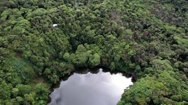 Beautiful cinematic aerial view of the Barva Volcano in the Braulio Carrillo National Park, its dens rain forest  in Costa Rica
