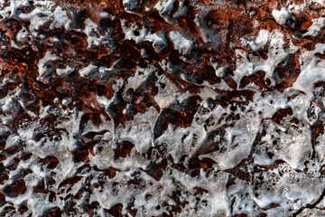 Volcanic rock surface with organic shapes texture