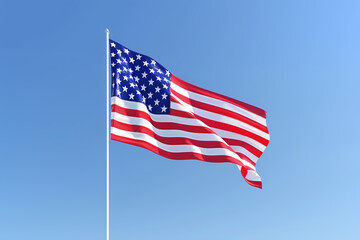 Obraz premium A vibrant American flag waving proudly against a clear blue sky, symbolizing freedom and patriotism.