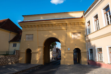 Fototapeta premium Entering Brasov through the Catherine's Gate (Poarta Ecaterinei), Brasov, Romania