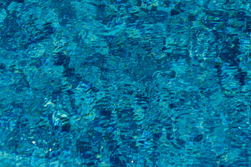 Blue ripped water in swimming pool
