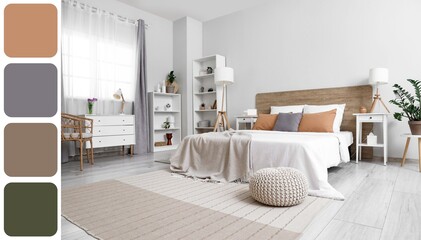Interior of stylish modern bedroom with big bed, shelving units, chest of drawers and bedside tables. Different color patterns