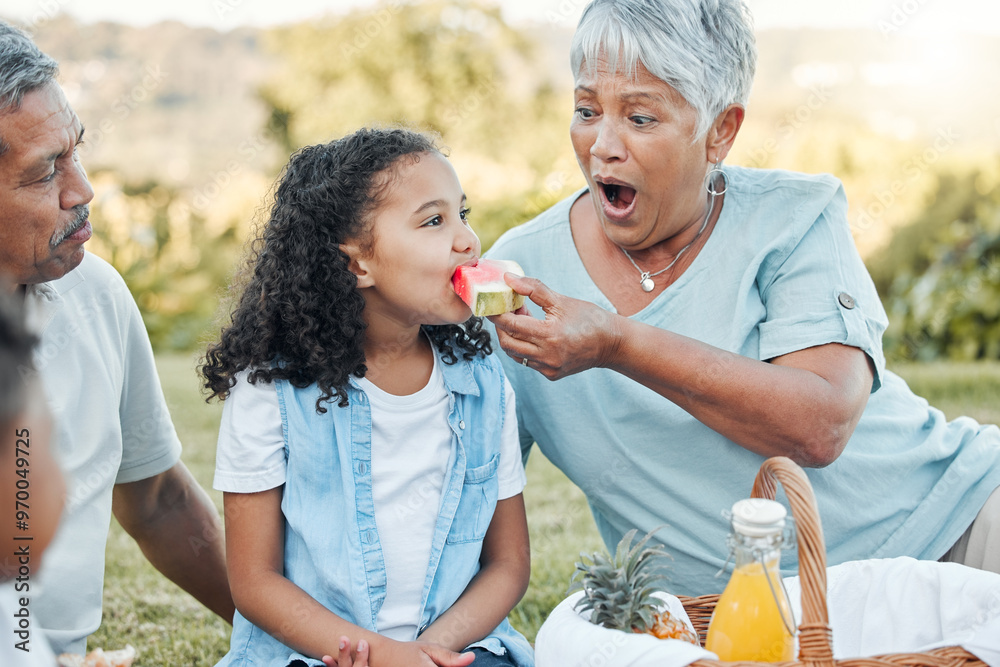 Poster Feeding, picnic and family and watermelon in park for food, bonding and summer vacation. Happiness, love and care with people eating fruit in nature for health, holiday event and lunch together