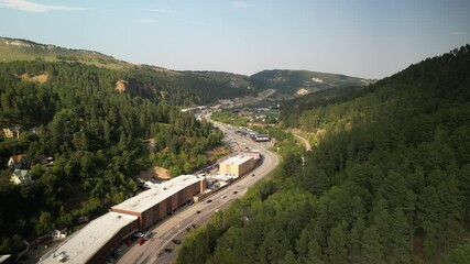 Aerial above downtown historic Deadwood South Dakota in Summer in Black Hills