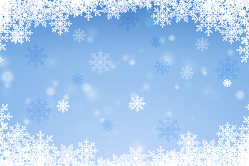 Magical snow background with bokeh effect. Ice particles. Creative snowflakes. Winter abstract blue background with snow