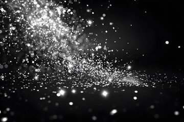Obraz premium Captivating Sparkle: A Glimpse of Shimmering Particles in Motion