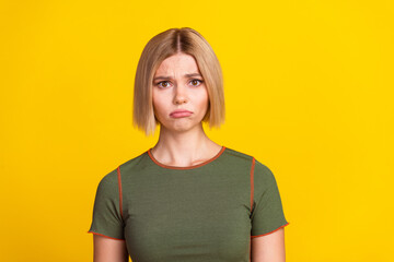 Photo of upset dissatisfied offended girl with bob hairstyle dressed khaki t-shirt astonished...