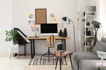 Beautiful office with workplace, modern computer and photographer gadgets