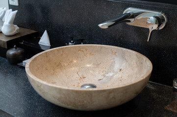 bathroom washing sink on marble stone