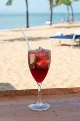 cocktail on a beach table