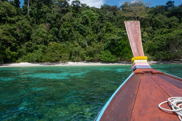 Long tail boat on the tropical beach in thailand