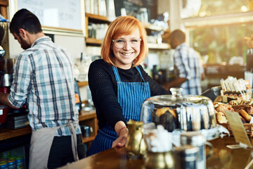 Portrait, barista or woman by counter in cafe, customer service and cashier working in coffee shop....