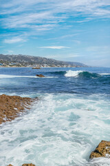 Beautiful landscape of Laguna Beach ocean coastline with palm trees in Treasure Island Park, Orange County, California, USA