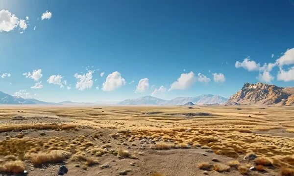 Rocky desert landscape under a clear blue sky, Video