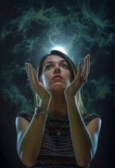 Woman looking up with hands raised, surrounded by smoke and dramatic lighting