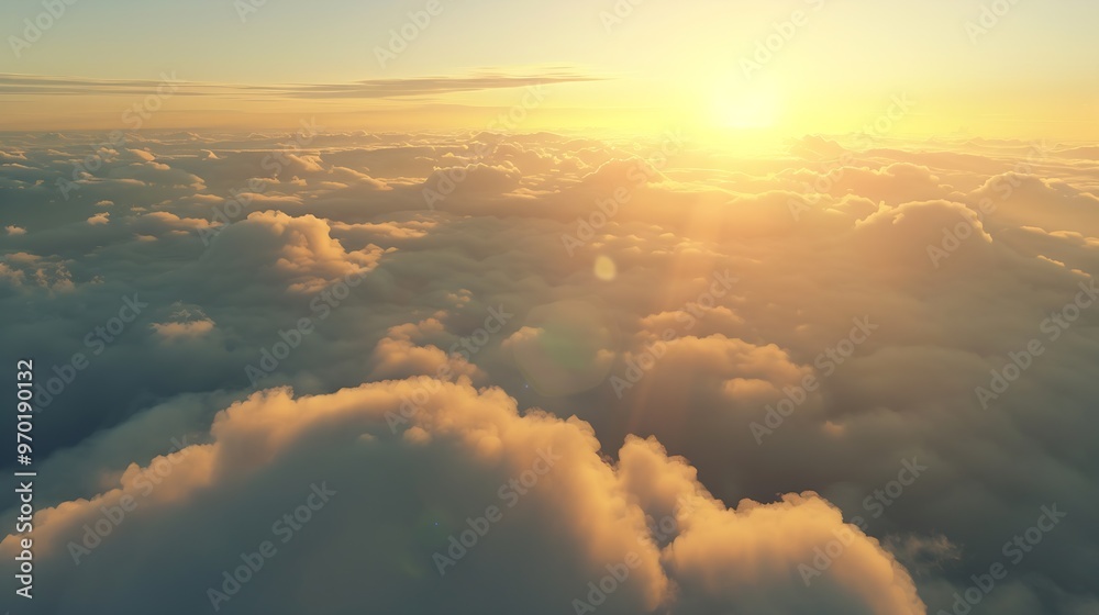 Wall mural an aerial shot above beautiful sunset clouds with sun shining on horizon detailed picturesque view a