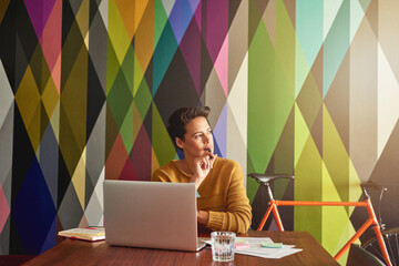 Thinking, creative or business woman in startup for insight, solution or problem solving. Planning...