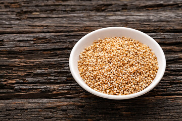 Bowl with amaranth pops - Amaranthus. wooden background