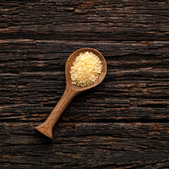 Japanese yellow panko crumbs on wooden spoon
