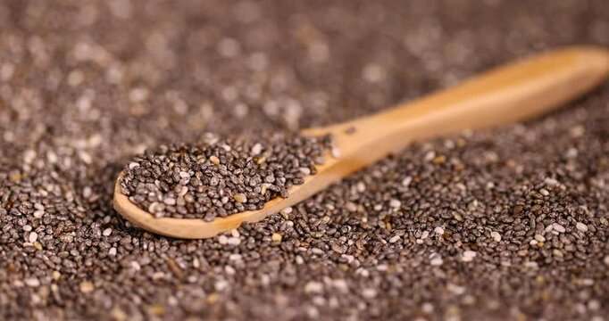 black and white chia seeds for a healthy diet, a large number of chia seeds for adding to yogurts, desserts and other food products