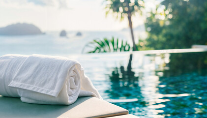 Obraz premium Luxury Poolside Towel by Tropical Resort.