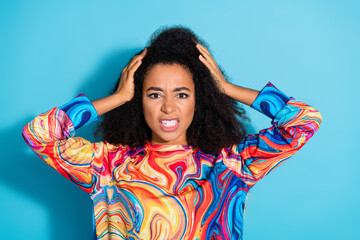 Photo of beautiful curly hair woman in trendy sweatshirt joking playing with her chevelure...