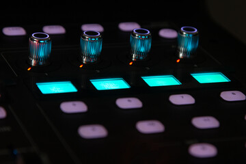 The volume control knob of a digital audio mixer.
