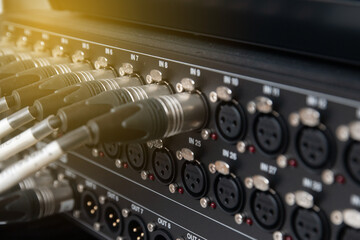 XLR jack to the preamplifier input. The system combines signals into the sound mixer.