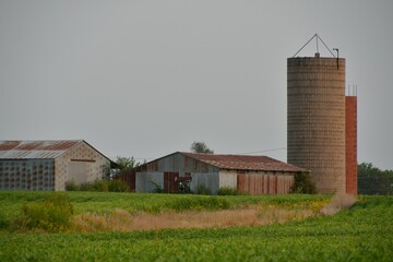 Barn and Silo in a Farm Field