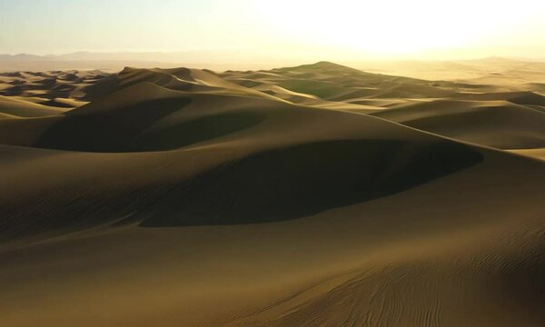 Drone Shot of Desert Sand Dunes at Golden Hour