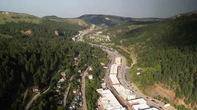 High aerial view of historic town of Deadwood South Dakota in summer in Black Hills