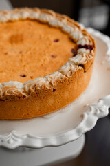 Cheesecake with golden crust and white cream
