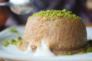 Indulge in a Delicious Sweet Semolina Dessert that is wonderfully topped with Pistachio