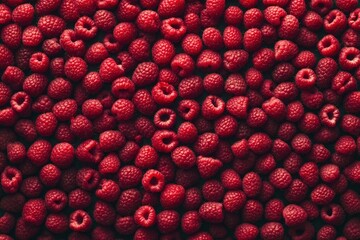 Background of fresh sweet red raspberries arranged together representing concept of healthy diet ,...