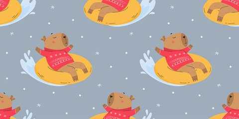 Funny capybara snow tubing seamless pattern