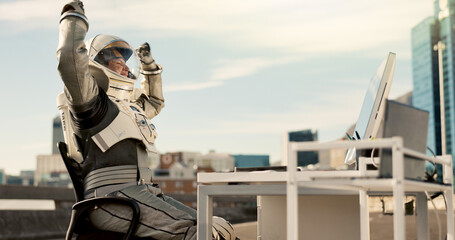 Celebration, city and astronaut working in road for business project with interstellar report for mission. Tech, person and space pilot at desk with discovery of civilization achievement in town. © HockleyM3/peopleimages.com