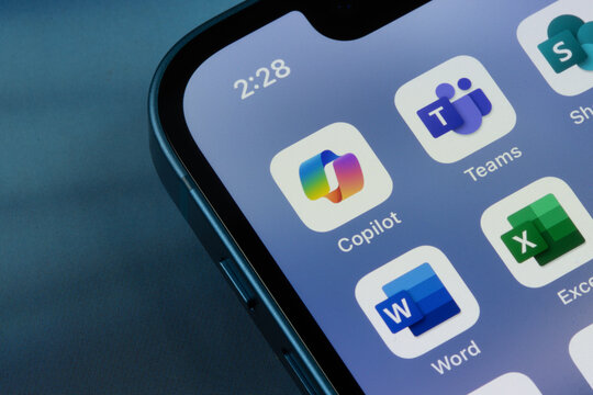 Portland, OR, USA - Mar 23, 2024: Microsoft Copilot app icon is seen among other Microsoft 365 apps on an iPhone.