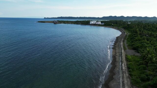 Virac, Catanduanes, Philippines - A Scenic Coastal Town With a Gas Station Visible Nearby - Aerial Drone Shot