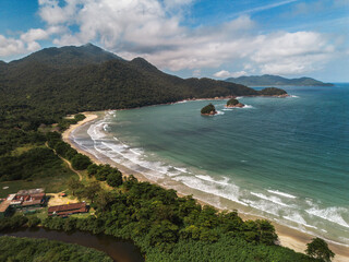 Aerial pictures from a beach from Isla grande brasil angra dos reis rio de janeiro paradise beach with mountains and waves to surf in a sunny day