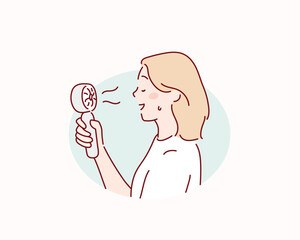 woman using portable fan in summer season. Hand drawn style vector design illustrations.
