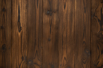 Obraz premium Close-up of Dark Brown Wooden Planks With Grain Texture for Background or Surface Use