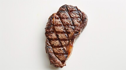 119. Freshly grilled beef entrecote steak from above, displaying distinct grill marks and a juicy, tender look. The white background enhances the steak rich colors and textures, making it the focal