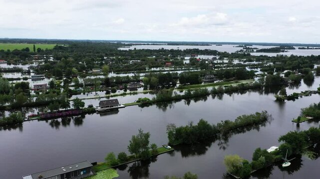 Fly Over Narrow Elongated Islands At Scheendijk Hamlet In North Holland, Netherlands. Aerial Drone Shot