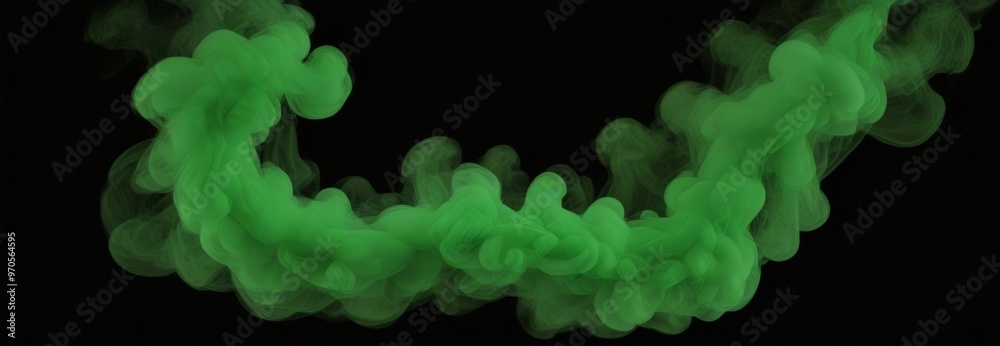 Leinwandbilder green smoke swirls against a black background, creating an abstract and dynamic visual effect.