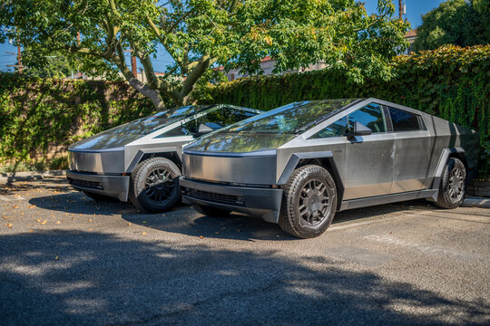 LOS ANGELES - September 5, 2024: A couple of new Tesla Cybertrucks electric pickup trucks parked in outdoor parking lot in West Hollywood, California.