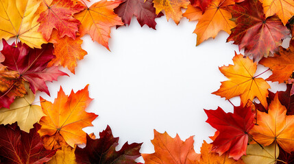 Obraz premium Colorful autumn leaves forming a frame around a white background, including vibrant orange, red, and yellow maple leaves