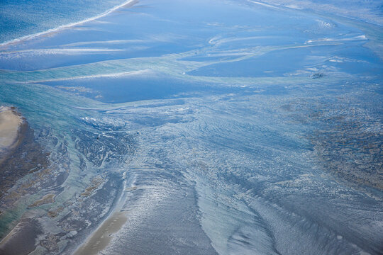 Aerial view of the tidal flats in the North Sea off the coast of north Friesland. Germany