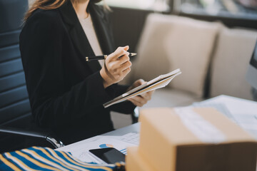 Successful Woman start up online seller at workplace. small business entrepreneur SME or freelance...
