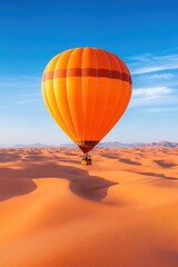 Obraz premium A vintage hot air balloon soaring above endless desert dunes, with soft shadows cast by the morning sun. 